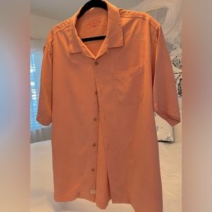 Tommy Bahama loose button down 100% silk shirt with chest pocket.